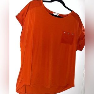 Rust orange blouse